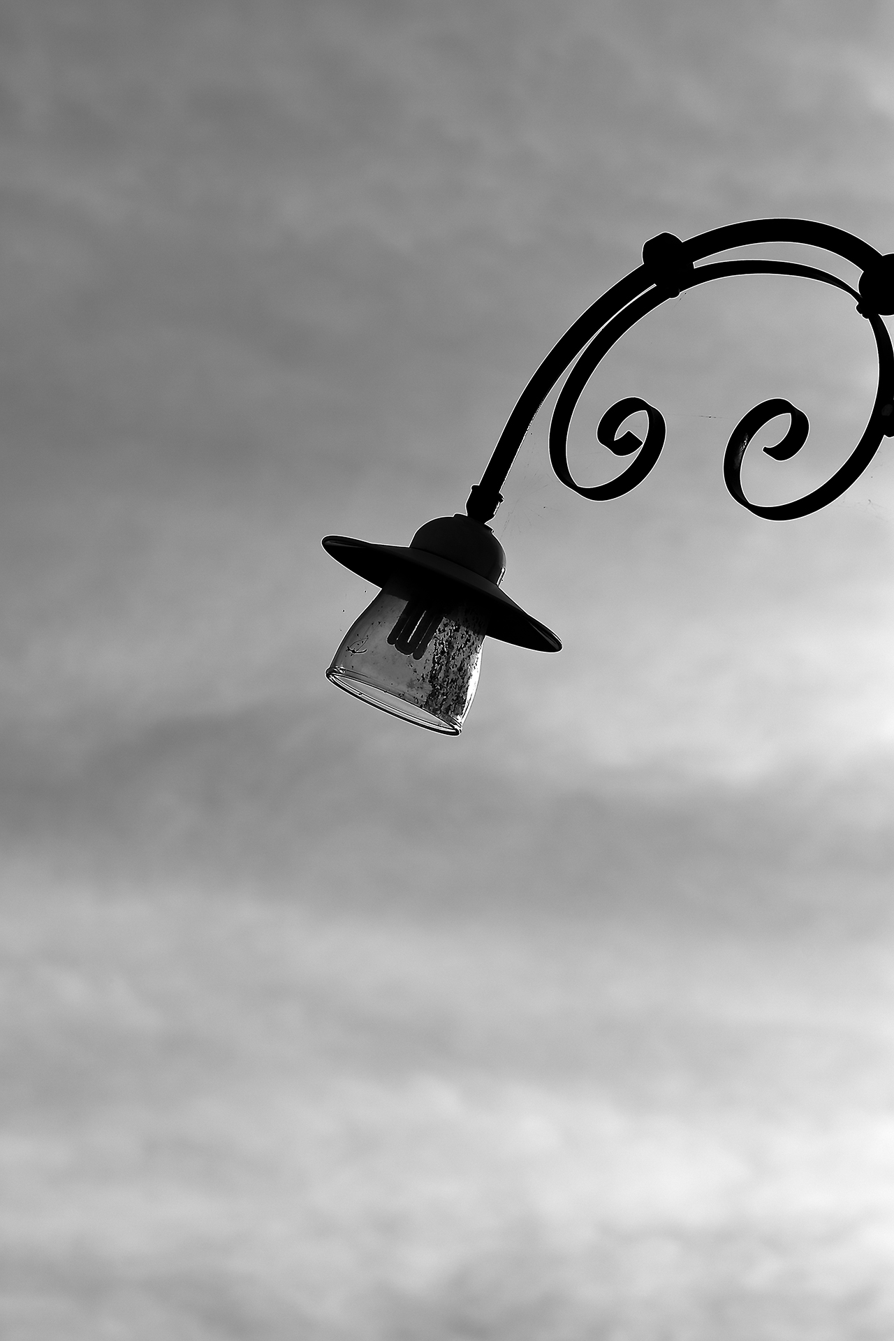 Rimini, man walking on the pier dressed in blue. One fishing