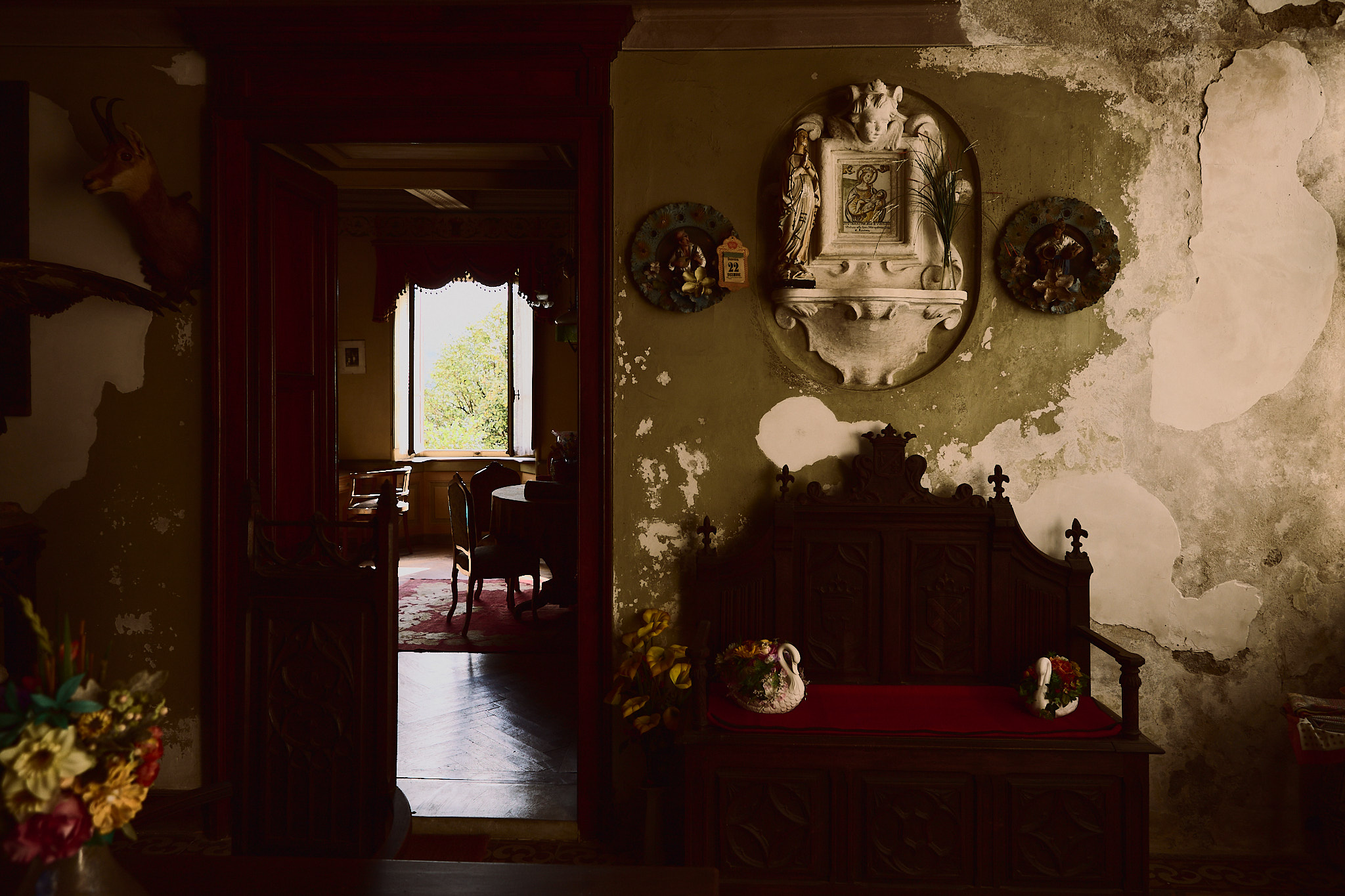 Luca Bertone - The Castle - Entrance to the hall with religious rose window and bench, Torricella - Vedeggio Valley - Switzerland